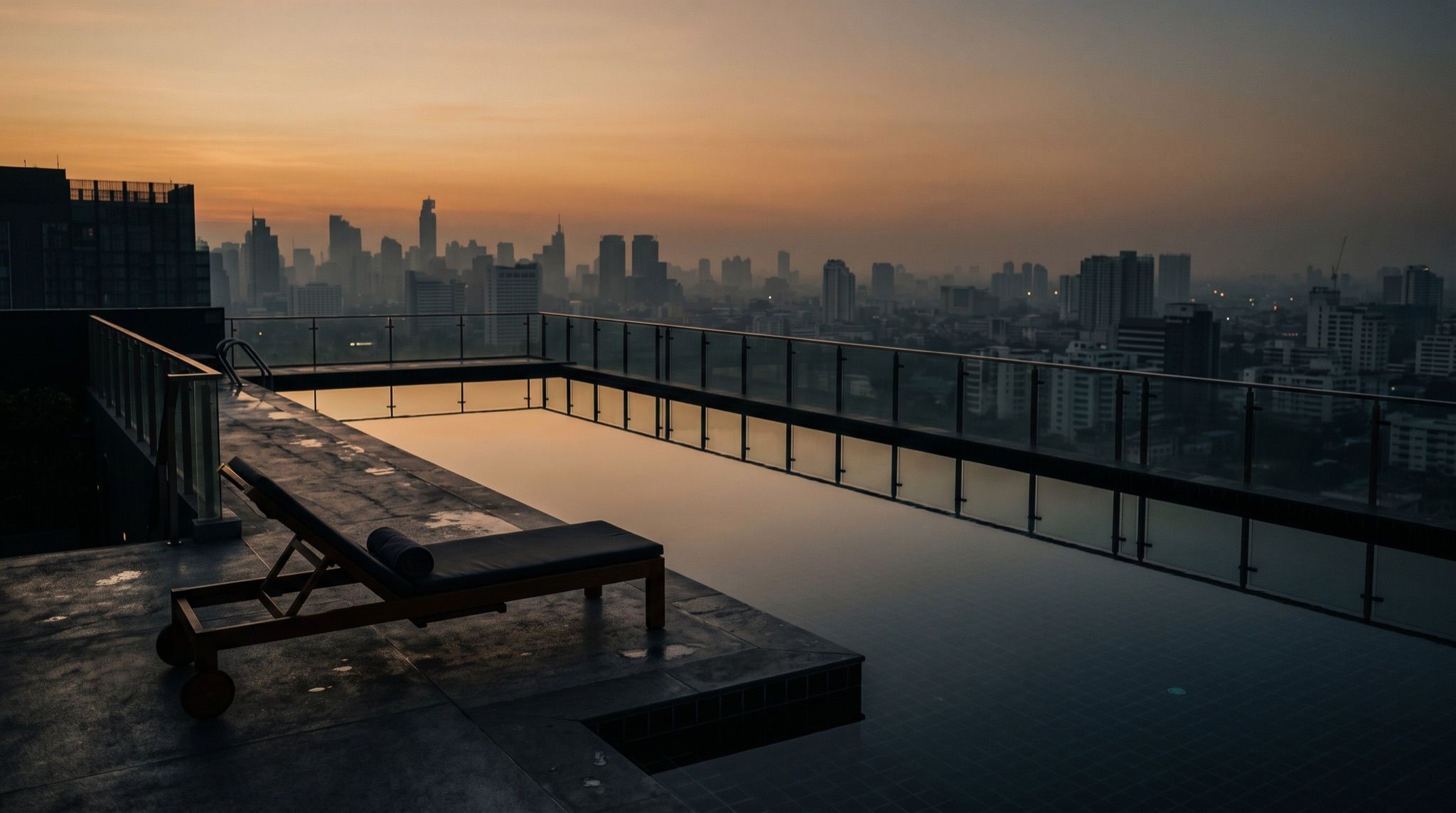 A still indoor pool lit from above